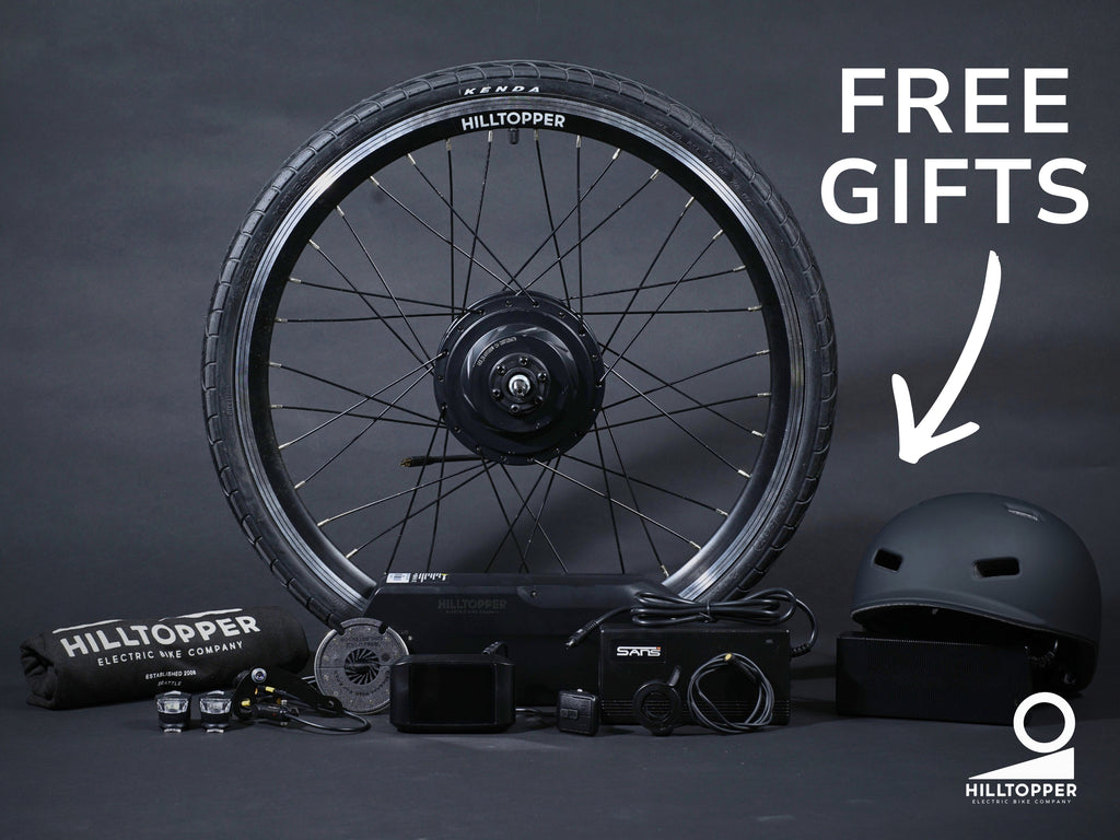 Summit conversion kit and helmet pictured beside the motor wheel, with Free gifts promotion