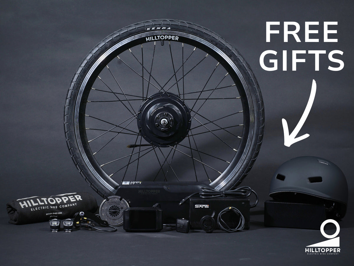 Summit conversion kit and helmet pictured beside the motor wheel, with Free gifts promotion